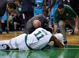 Boston Celtics star guard Kyrie Irving has suffered a setback after an operation discovered a bacterial infection in his surgically repaired left knee and the 26 year old will miss the rest of the regular season and playoffs. (Image: USA Today Sports)