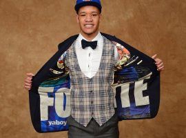 Kevin Knox, then a freshman from Kentucky, displays the Fortnite logo on the inside of his suit jacket before the 2018 NBA Draft. (Image: Jennifer Pottheiser/Getty)