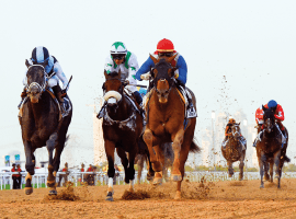 Plus Que Parfait (red cap) sweet in UAE Derby. Image: (Virendra Saklani/Gulf News)