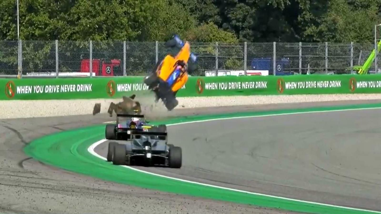 Sausage curb flips Alex Peroni's Formula car