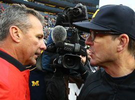 Could Michigan pull the ultimate switch-a-roo and hire Urban Meyer? (Image: Sporting News)