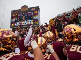 Minnesota Gophers football players celebrate with students and fans after their 31-26 upset victory over #4 Penn State at TCF Bank Stadium in Minneapolis. (Image: Jesse Johnson/USA Today Sports)