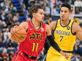 Atlanta Hawks guard Trae Young drives by Indiana Pacers point guard Malcolm Brogdon during an overtime loss in Indianapolis. (Image: Trevor Ruszkowski/USA Today Sports)