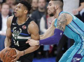 Charlotte Hornets center Willy Hernangomez fouls Milwaukee Bucks All-Star Giannis Antetokounmpo during an NBA game in Paris, France. (Image: Thibault Camus/AP)