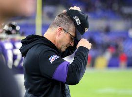 Baltimore coach John Harbaugh can barely watch as his team suffered an early exit in the playoffs after the Tennessee upset. (Image: Getty)