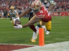 San Francisco 49ers RB Raheem Mostert dives for a touchdown during a victory over the Green Bay Packers in the NFC Championship at Levi Stadium in Santa Clara, CA. (Image: Kyle Terada/USA Today Sports)