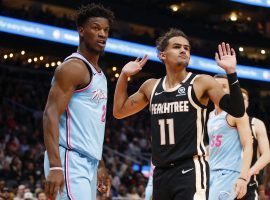 Miami Heat guard Jimmy Butler (left) and Atlanta Hawks guard Trae Young during a game at State Farm Arena in Atlanta, GA. Â (Image: Todd Kirkland/Getty)