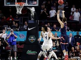 St. Mary's guard Jordan Ford knocks down the game-winner to defeat BYU in the WCC tournament semifinals at the Orleans Arena in Las Vegas. (Image: Isaac Brekken/AP)