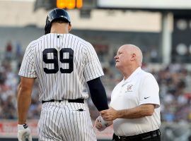 New York Yankees RF Aaron Judge with trainer Steve Donahue during a game in 2018 at Yankee Stadium in the Bronx. (Image: Elsa/Getty)