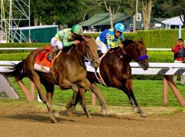 Keen Ice (left) beat Triple Crown winner American Pharoah in the 2015 Travers Stakes. The historic race moved up three weeks this year to Aug. 8. (Image: Dan Heary/For the Boston Globe)