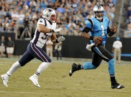 New England Patriots Linebacker Kyle Van Noy pursues Carolina Panthers QB Cam Newton in 2018 in Charlotte, NC. (Image: Mike McCarn/AP)