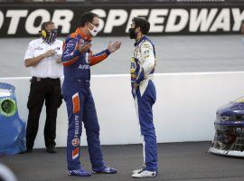 Joey Logano and Chase Elliott meet in the infield at theSupermarket Heroes 500 after the two were involved in a crash. (Image: AP)