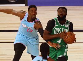 Miami Heat forward Bam Adebayo defends Boston Celtics guard Jaylen Brown. (Image: Kim Klement/USA Today Sports)