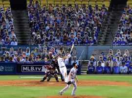 Dodger Stadium owns a reputation as the ballpark to see and be seen. For $299, your likeness can join Mary Hart, Mike Brito, Tommy Lasorad and other celebrities behind home plate. (Image: MLB.com)