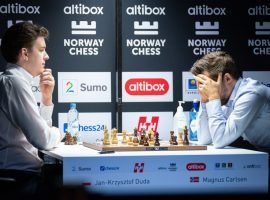 Magnus Carlsen (right) lost his first classical chess game in over two years on Saturday, as Jan-Krzysztof Duda (left) defeated him at Norway Chess. (Image: Lennart Ootes/Altibox Norway Chess)