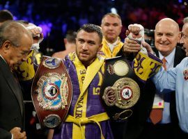 Vasiliy Lomachenko (pictured) will take on Teofimo Lopez in a lightweight title unification bout on Saturday. (Image: AP)