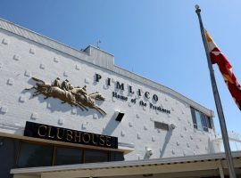 The venerable Pimlico Race Course clubhouse will play host to a small group of owners for Saturday's 145th Preakness Stakes. (Image: Getty)