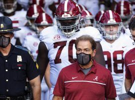 Alabama coach Nick Saban, who was infected with COVID-19 in October, will not lead his Crimson Tide into battle vs. LSU this weekend because of the pandemic. (Image: Getty)