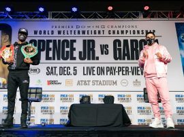 Errol Spence (left) will defend his welterweight titles on Saturday night against Danny Garcia (right). (Image: Ryan Hafey/Premier Boing Champions)