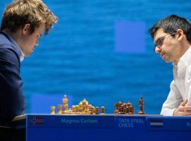 Anish Giri (right) held a draw against Magnus Carlsen (left) to maintain his half-point lead at the Tata Steel Masters. (Image: Jurriaan Hoefsmit/Tata Steel Chess Tournament 2021)