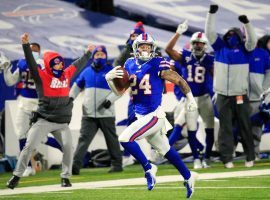 Buffalo Bills cornerback Taron Johnson, seen here running back an interception for a touchdown against the Baltimore Ravens, helped propel the Bills to a berth in the AFC title game for the first time in 27 years. (Image: Mark Konezny/USA Today Sports)