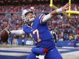 Josh Allen of the Buffalo Bills celebrates a touchdown. The Bills hold the #2 seed in the AFC and host the Indianapolis Colts in Wild Card weekend. (Image: Jeff T. Allen/AP)