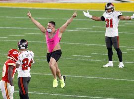 Bovada has voided many bets on its Super Bowl streaker prop bet, after Yuri Andrade (center) gave interviews revealing a planned effort to win money by running on the field. (Image: Kim Klement/USA Today Sports)