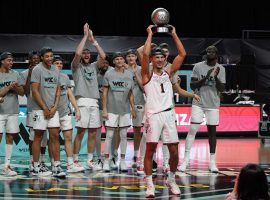 Jalen Suggs, freshman guard from Gonzaga, holds the WCC tournament championship trophy after Gonzaga defeated BYU at the Orleans Arena in Las Vegas. (Image: Kirby Lee/USA Today Sports)