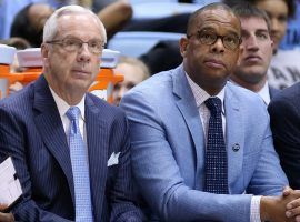 Roy Williams and Hubert Davis (right) sitting on the North Carolina bench during a game in 2020. (Image: Getty)