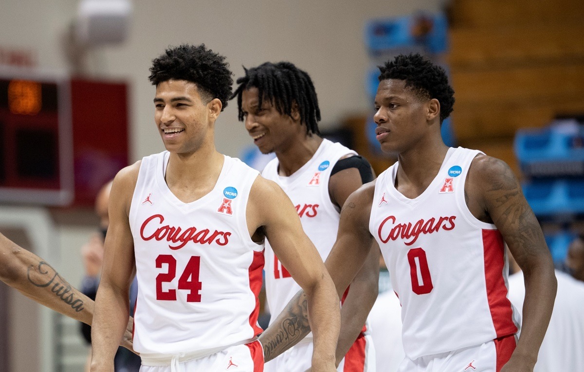 Quentin Grimes (24), the top scorer for the Houston Cougars, celebrates a victory with teammates Marcus Sasser (0). (Image: Ben Solomon/Getty)