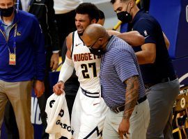 Jamal Murray suffered a torn ACL during Mondayâ€™s game against the Golden State Warriors, an injury that could sink the Denver Nuggetsâ€™ title hopes. (Image: Getty)