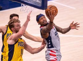 Bradley Beal of the Washington Wizards takes an acrobatic shot against the Indiana Pacers during another shootout before his minor hamstring injury. (Image: Getty)