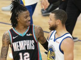 Ja Morant of the Memphis Grizzlies and Steph Curry from the Golden State Warriors during the final game of the regular season. (Image: Getty)