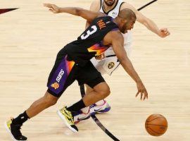 Chris Paul of the Phoenix Suns blows by Facundo Campazzo from the Denver Nuggets in Game 1 of the Western Conference semifinals. (Image: Porter Lambert/Getty)