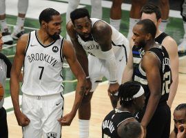 Kevin Durant (7) of the Brooklyn Nets and Khris Middleton (22) from the Milwaukee Bucks talk smack to one another during Game 6 of the Eastern Conference semifinals at Fiserv Forum on Milwaukee. (Image Michael McLoon/Image: USA Today Sports)