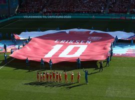 Denmark's players and UEFA honored Eriksen with a huge shirt printed with his name ahead of the game against Belgium. (Image: Twitter/DBUfodbold)