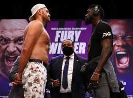 A COVID-19 outbreak could delay the third fight between Tyson Fury (left) and Deontay Wilder (right). (Image: Mikey Williams/Top Rank/Getty)