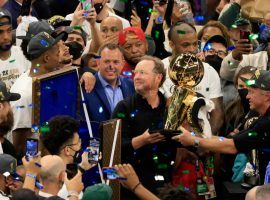 Head coach Mike Budenholzer clutches the championship trophy after the Milwaukee Bucks defeated the Phoenix Suns in the 2021 NBA Finals. (Image: Justin Casterline/Getty)