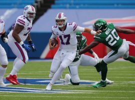 Josh Allen evades defenders from the New York Jets last season in Orchard Park, NY. (Image: Jets)