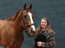 Assistant trainer Laura Moquett, the wife of trainer/co-owner Ron Moquett, was the only one who galloped Whitmore during his storied career. The 8-year-old Champion Sprinter retired Saturday. (Image: Richard Rasmussen/Sentinel-Record)