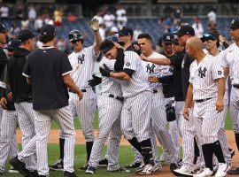 The Yankees came from behind to beat the Twins on Monday, rallying to remain tied with the Red Sox for the final AL wild card position. (Image: Charles Wenzelberg/New York Post)