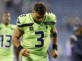 Seattle Seahawks quarterback Russell Wilson jogs off the field after he incurred a finger injury a loss against the LA Rams on Thursday Night Football. (Image: Porter Lambert/Getty)