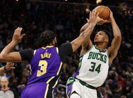 Milwaukee Bucks big man Giannis 'Greek Freak' Antetokounmpo shoots over Anthony Davis of the LA Lakers during a victory at Fiserv Forum in Milwaukee. (Image: Jeff Hanisch/USA Today Sports)