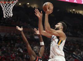 Rudy Gobert of the Utah Jazz shoots over Tony Snell from the Portland Trail Blazers at the Moda Center. (Image: Amanda Loman/AP)