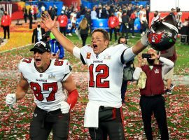 Rob Gronkowski and Tom Brady from the Tampa Bay Bucs celebrate a victory in Super Bowl 55. (Image: Mike Ehrmann/Getty)