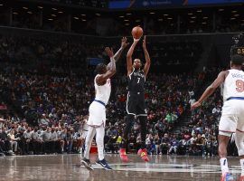 Kevin Durant from the Brooklyn Nets pulls up for a 3-point shot against Julius Randle of the New York Knicks. (Image: Getty)