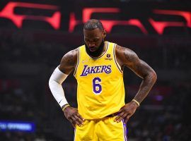 An exhausted LeBron James from the LA Lakers walks off the court during recent loss. (Image: Getty)