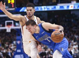 Luka Doncic from the Dallas Mavs drives against Devin Booker of the Phoenix Suns, and the two leading scorers meet again in Game 3 of the Western Conference Semifinals. (Image: Kevin Jairaj/USA Today Sports)