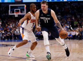 Chris Paul from the Phoenix Suns defends Luka Doncic of the Dallas Mavs, but now the two face a single-game elimination in Game 7 to determine the winner of their series. (Image: Getty)