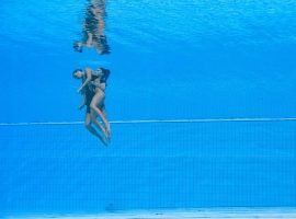 Anita Alvarez lost consciousness during her solo artistic performance at the world championships in Budapest, but coach Andrea Fuentes jumped into the pool to rescue her. (Image: Oli Scarff/AFP/Getty)